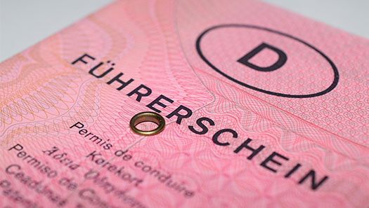 Abbildung eines alten rosa Papierführerscheins